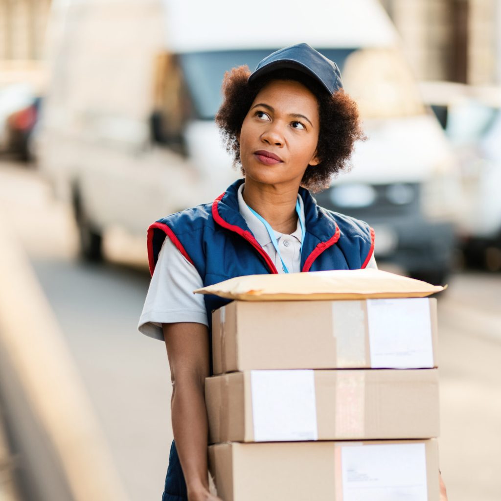 black-female-courier-carrying